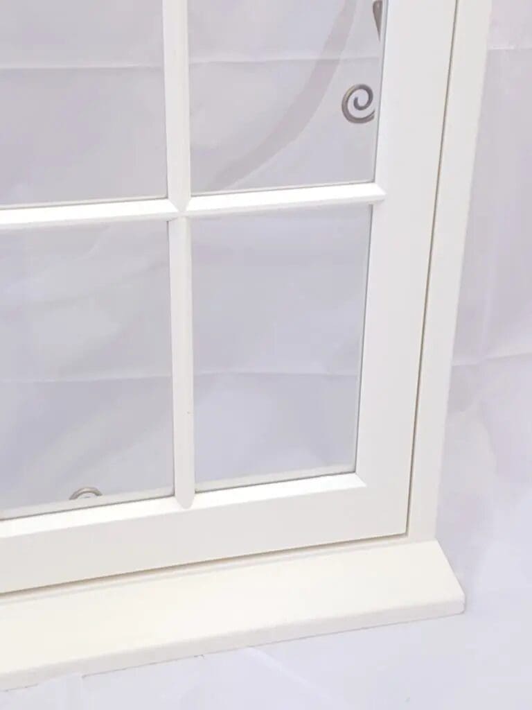 Close up of astragals on SpaciaTM vacuum double glazing a perfect replacement window in a conservation area