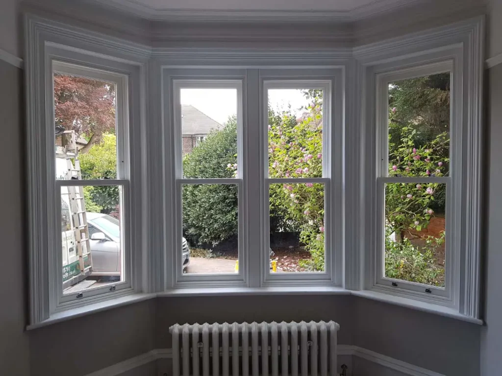 Internal bay with white timber sash windows
